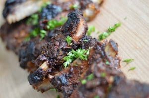 Ribs don't always have to be cooked on the grill. This recipe calls for a delicious homemade rib rub slathered on a rack of ribs and then cooked in the oven. The flavor is out of this world!