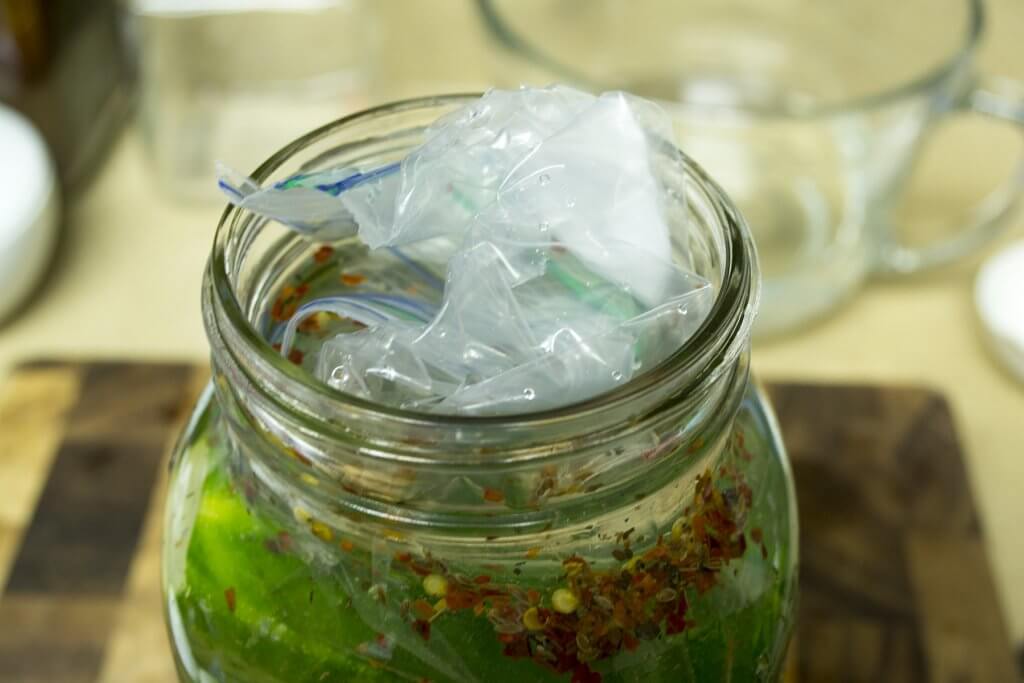 fermented-pickles-add-brine-and-bag